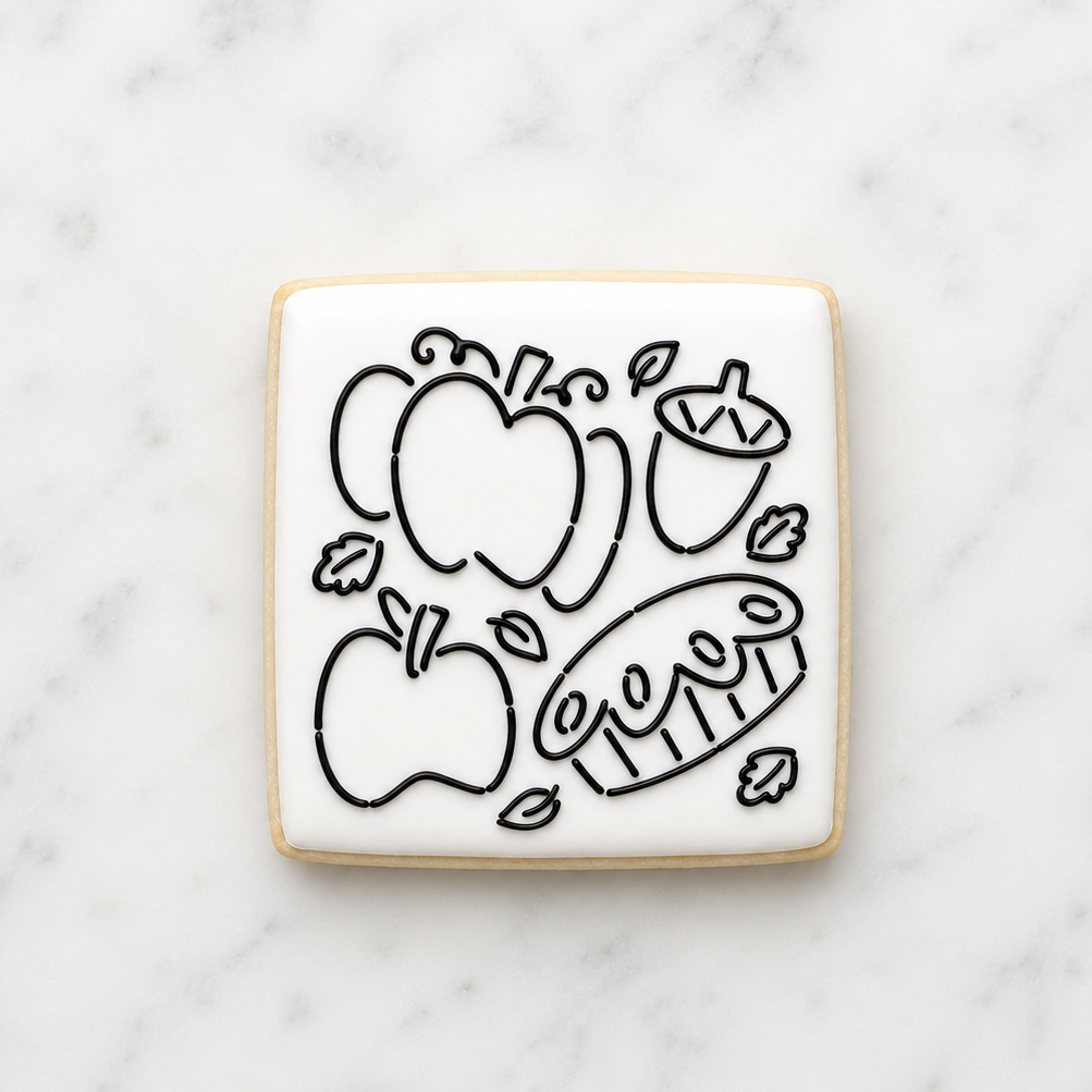Fall Faves PYO Cookie Stencil decorated in black royal icing on a white, square sugar cookie, BakeArt Stencils