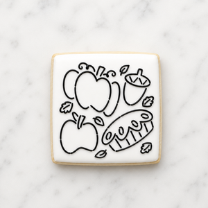 Fall Faves PYO Cookie Stencil decorated in black royal icing on a white, square sugar cookie, BakeArt Stencils