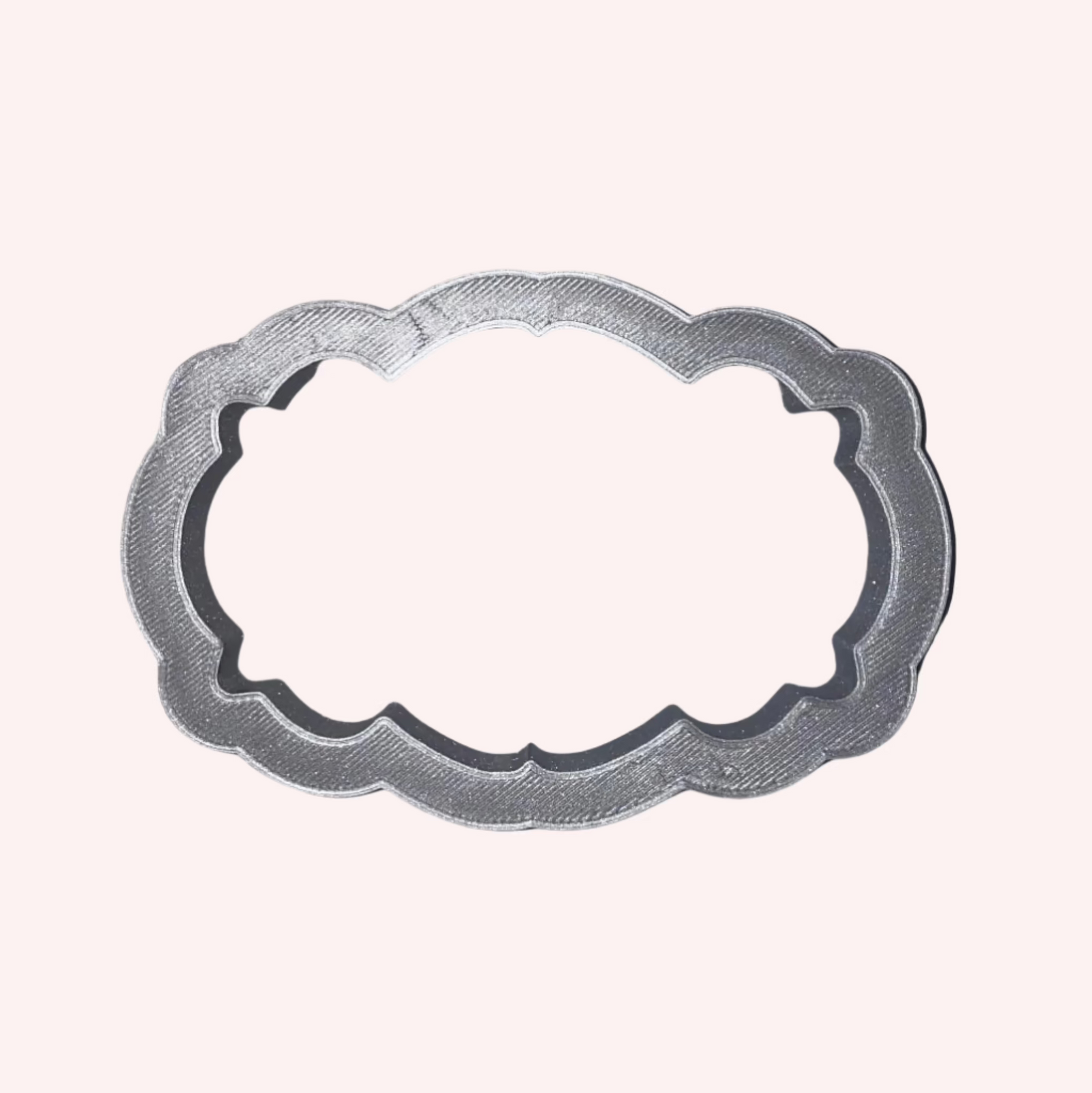 Giulia Plaque Cookie Cutter, a 3-D printed cutter for decorating sugar cookies.